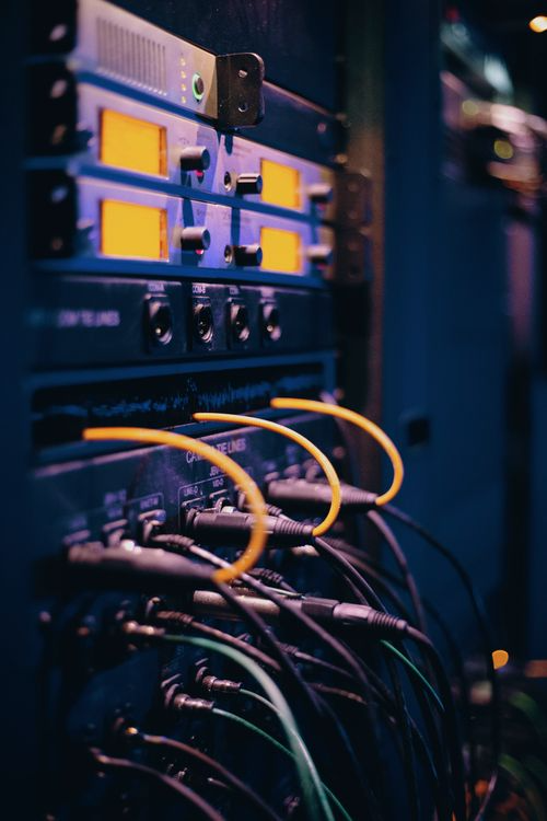 Network equipment with connected fiber and data cables